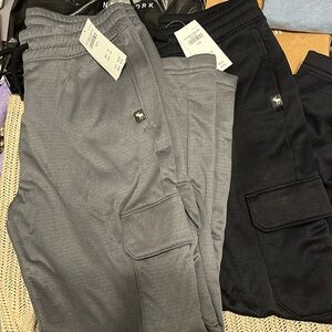 2 pairs of Utility tapered boys pants with cargo pockets and side pockets.